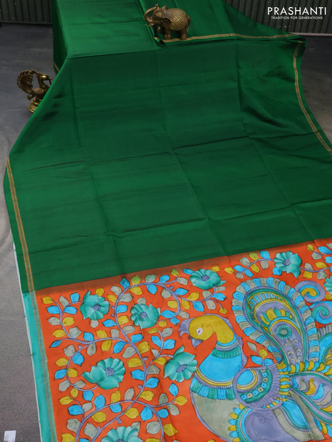 Pure soft silk saree green and orange with plain body and hand painted kalamkari printed pallu