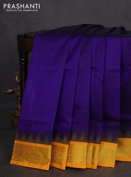 Silk cotton saree blue and yellow with plain body and temple design zari woven korvai border