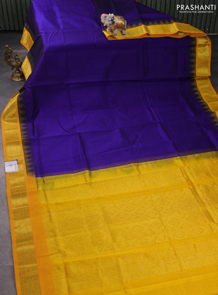 Silk cotton saree blue and yellow with plain body and temple design zari woven korvai border