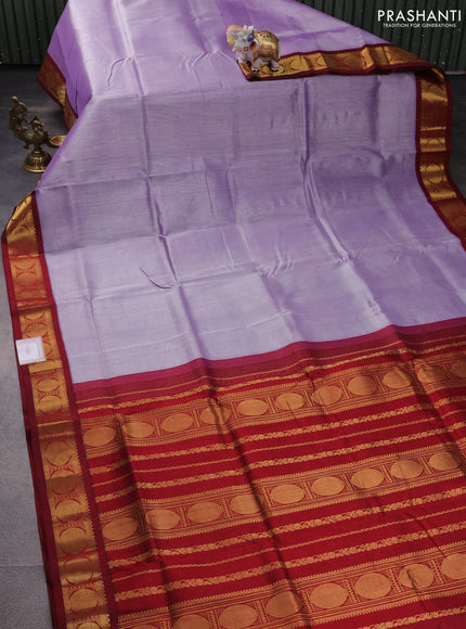 Silk cotton saree lavender and maroon with plain body and rudhraksha zari woven korvai border