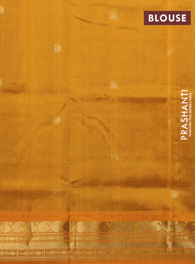 Silk cotton saree green and mustard yellow with paisley zari woven buttas and zari woven korvai border