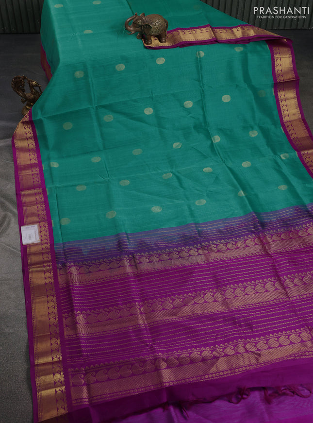 Silk cotton saree teal green shade and purple with rudhraksha zari woven buttas and zari woven korvai border