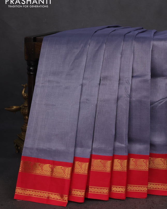 Silk cotton saree grey and reddish pink with plain body and rettapet zari woven korvai border