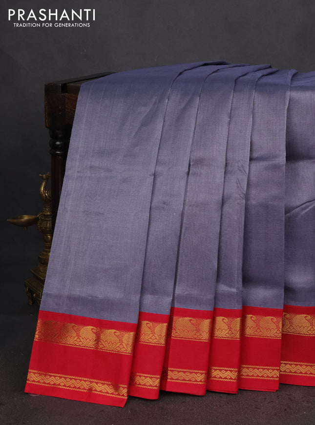 Silk cotton saree grey and reddish pink with plain body and rettapet zari woven korvai border