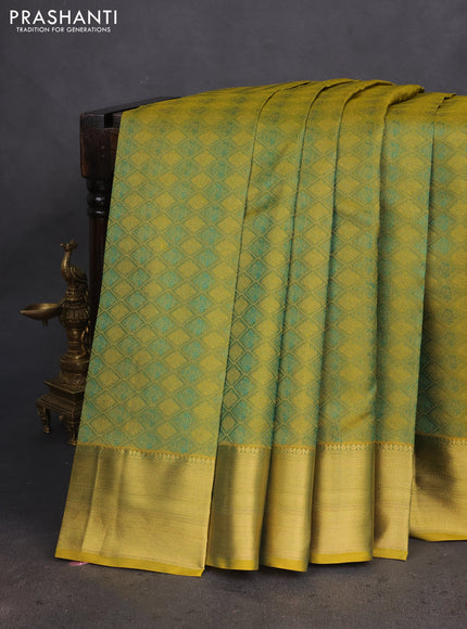 Pure kanchipuram silk saree dual shade of mehendi green and mustard shade with allover self emboss & zari weaves and rich zari woven border