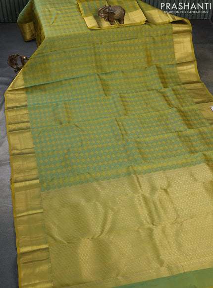 Pure kanchipuram silk saree dual shade of mehendi green and mustard shade with allover self emboss & zari weaves and rich zari woven border