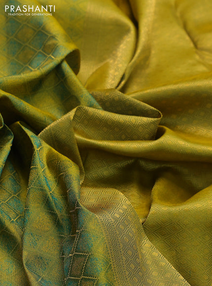 Pure kanchipuram silk saree dual shade of mehendi green and mustard shade with allover self emboss & zari weaves and rich zari woven border