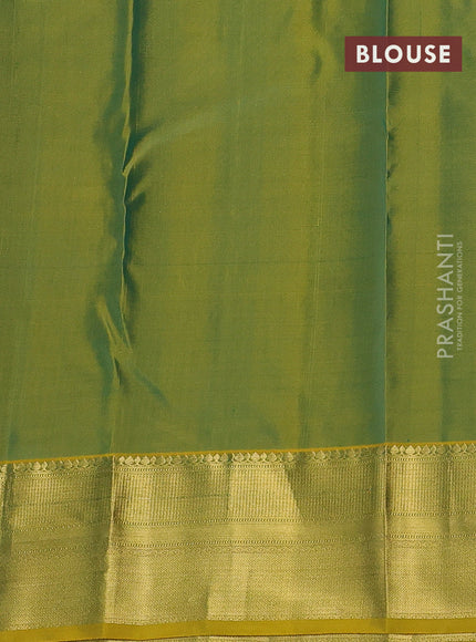 Pure kanchipuram silk saree dual shade of mehendi green and mustard shade with allover self emboss & zari weaves and rich zari woven border