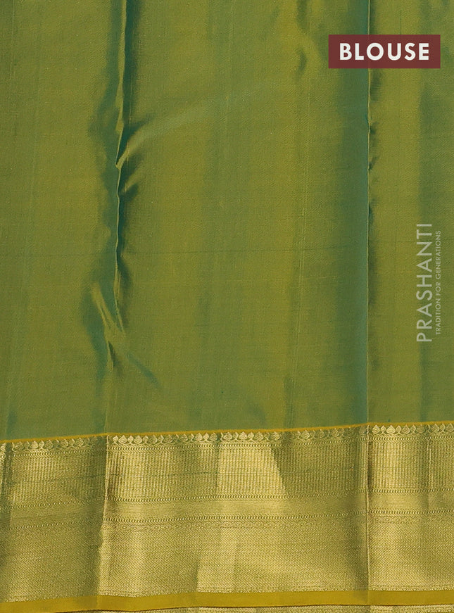 Pure kanchipuram silk saree dual shade of mehendi green and mustard shade with allover self emboss & zari weaves and rich zari woven border
