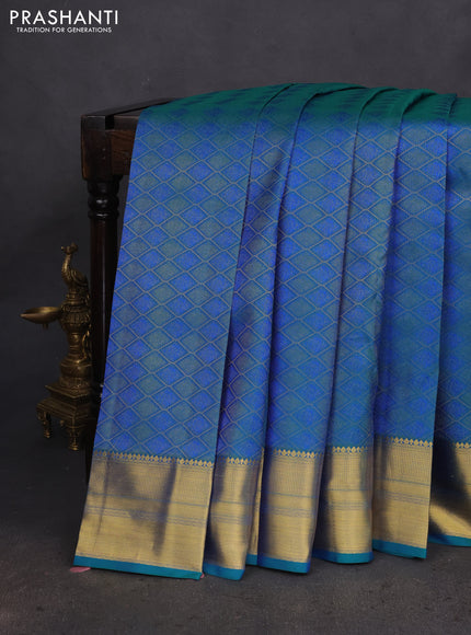 Pure kanchipuram silk saree dual shade of teal green with allover self emboss & zari weaves and rich zari woven border