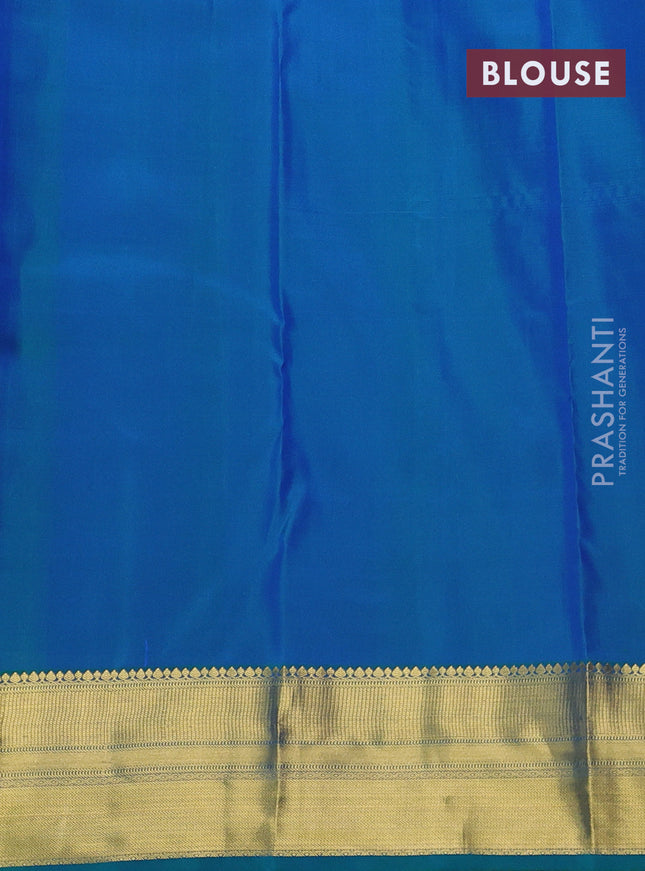 Pure kanchipuram silk saree dual shade of teal green with allover self emboss & zari weaves and rich zari woven border