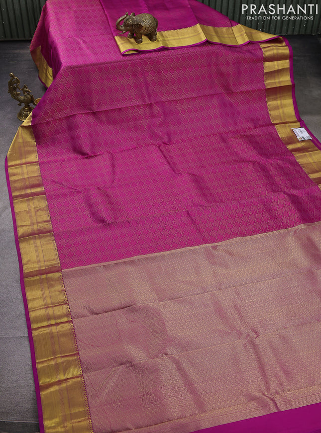 Pure kanchipuram silk saree magenta pink with allover self emboss & zari weaves and rich zari woven border