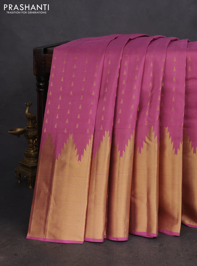 Pure kanchipuram silk saree mauve pink with allover zari woven buttas and long temple design zari woven border