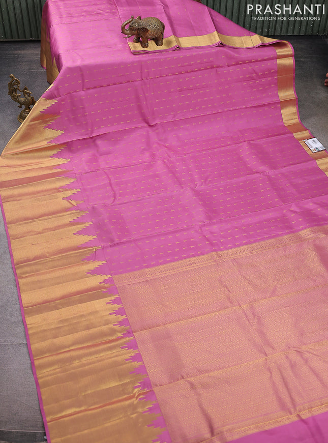 Pure kanchipuram silk saree mauve pink with allover zari woven buttas and long temple design zari woven border