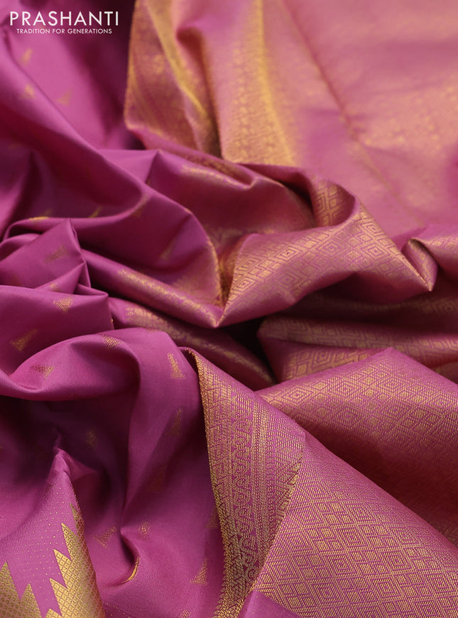 Pure kanchipuram silk saree mauve pink with allover zari woven buttas and long temple design zari woven border