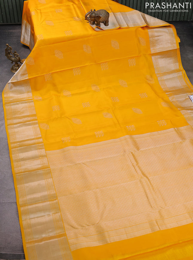 Pure kanchipuram silk saree yellow with self emboss & silver zari buttas and silver zari woven border
