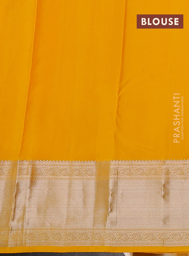Pure kanchipuram silk saree yellow with self emboss & silver zari buttas and silver zari woven border