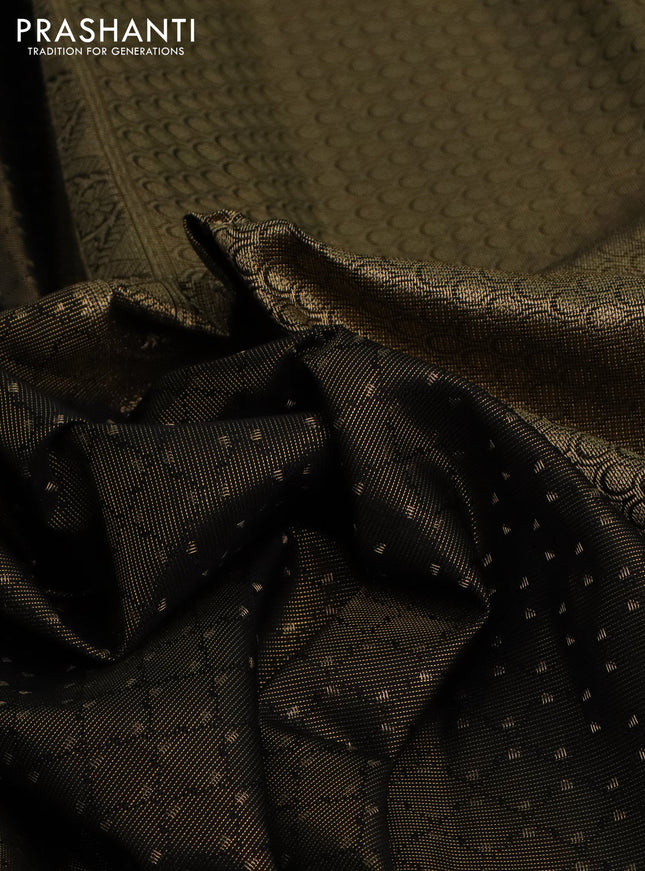 Pure kanchipuram silk saree black and teal blue with allover self emboss & zari weaves and rich zari woven border