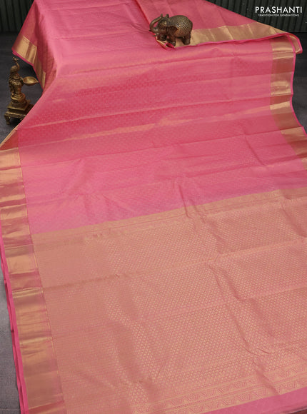 Pure kanchipuram silk saree peach pink and teal blue with allover self emboss & zari weaves and rich zari woven border