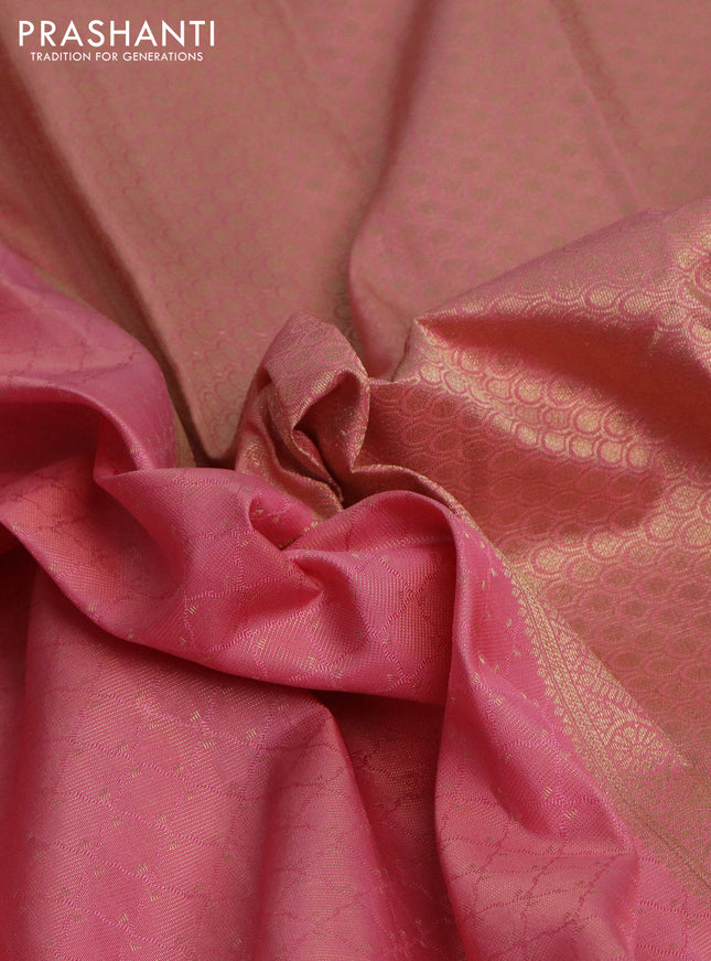 Pure kanchipuram silk saree peach pink and teal blue with allover self emboss & zari weaves and rich zari woven border