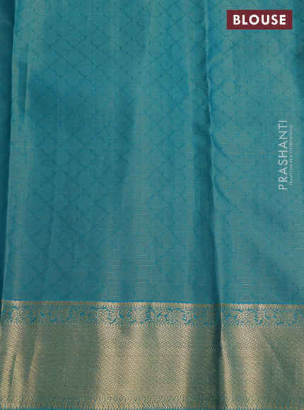 Pure kanchipuram silk saree peach pink and teal blue with allover self emboss & zari weaves and rich zari woven border