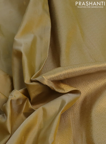 Pure kanchipuram silk saree sandal with allover zari woven temple buttas and rich zari woven border