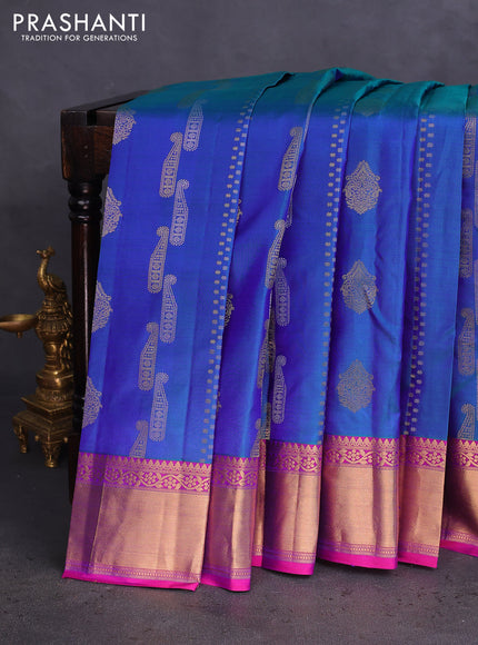 Pure kanchipuram silk saree dual shade of bluish green and purple with silver & gold zari woven buttas and rich zari woven border