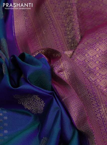 Pure kanchipuram silk saree dual shade of bluish green and purple with silver & gold zari woven buttas and rich zari woven border