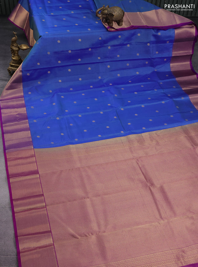 Pure kanchipuram silk saree dual shade of blue and purple with allover zari weaves & buttas and zari woven border