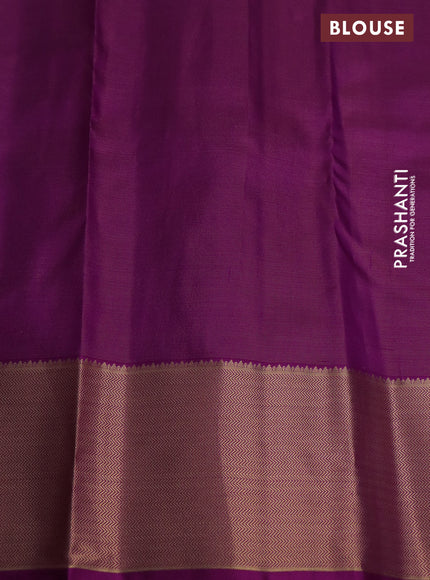 Pure kanchipuram silk saree dual shade of blue and purple with allover zari weaves & buttas and zari woven border