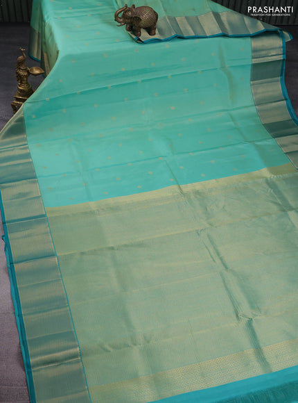 Pure kanchipuram silk saree teal green shade and teal green with allover zari weaves & buttas and zari woven border