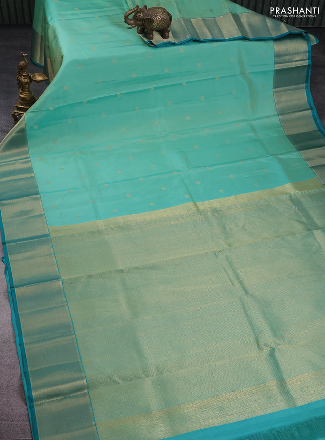 Pure kanchipuram silk saree teal green shade and teal green with allover zari weaves & buttas and zari woven border