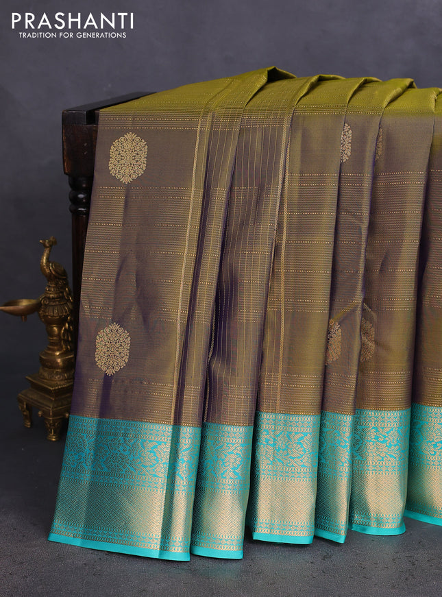 Pure kanchipuram silk saree dual shade of sap green and teal blue with allover zari checks & buttas and rich zari woven korvai border