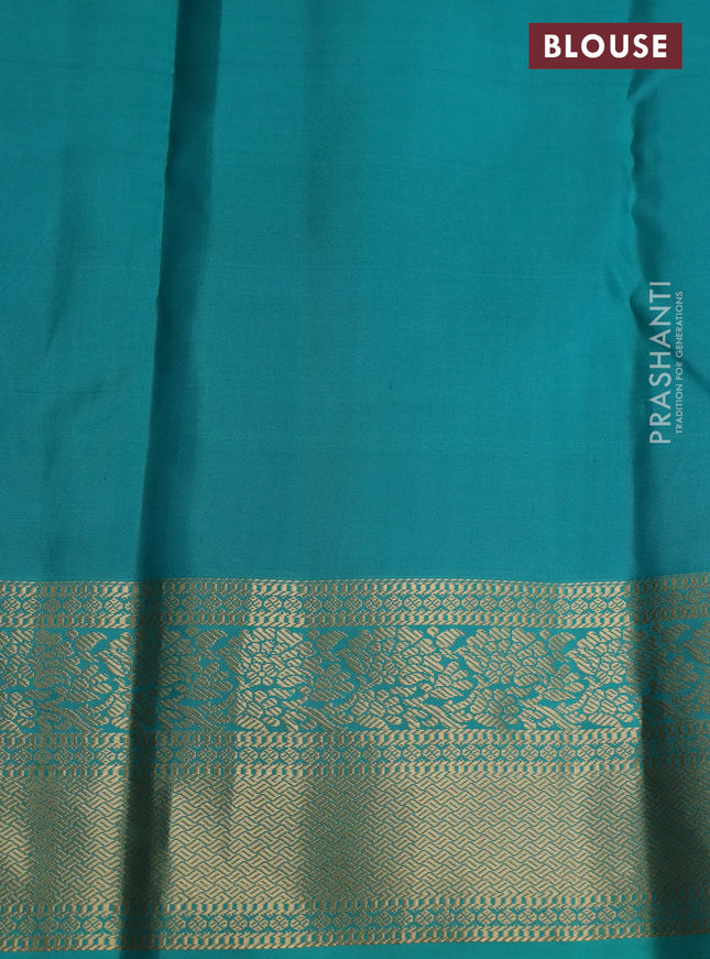 Pure kanchipuram silk saree dual shade of sap green and teal blue with allover zari checks & buttas and rich zari woven korvai border