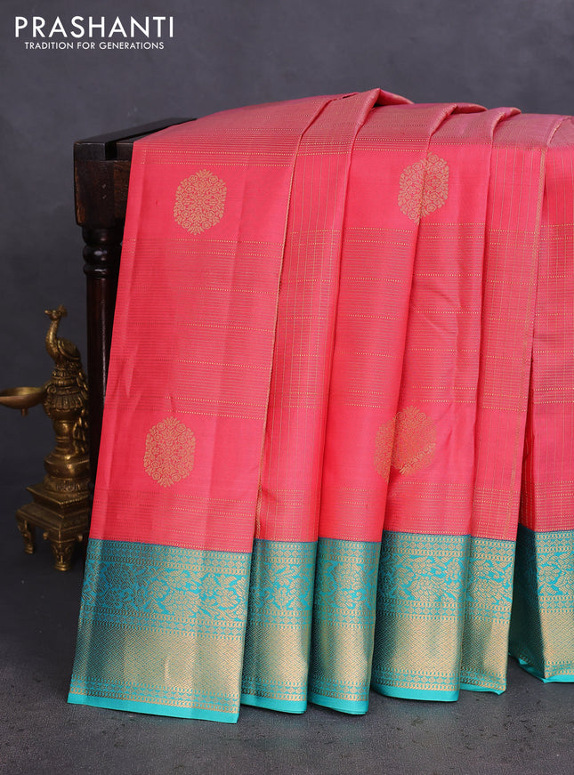 Pure kanchipuram silk saree peach pink and teal blue with allover zari checks & buttas and rich zari woven korvai border