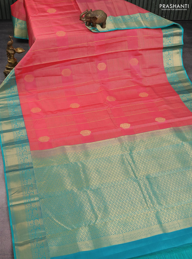 Pure kanchipuram silk saree peach pink and teal blue with allover zari checks & buttas and rich zari woven korvai border