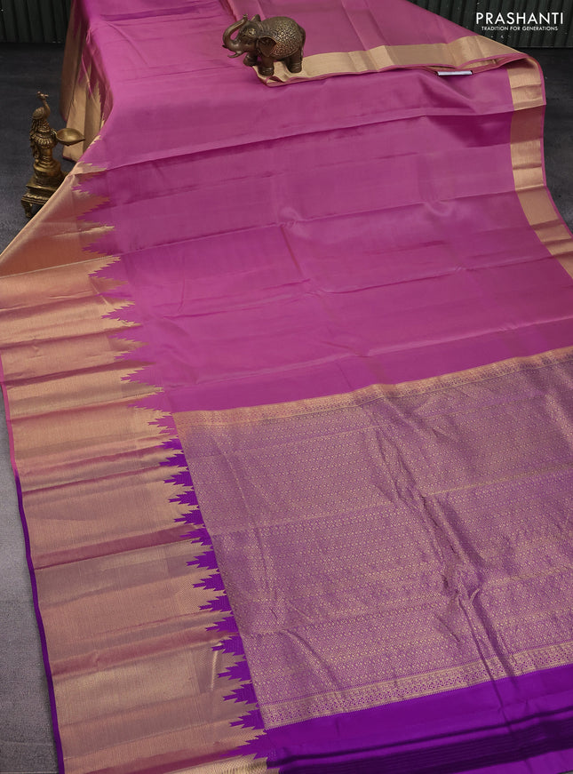 Pure kanchipuram silk saree mauve pink and violet with plain body and long temple design zari woven border