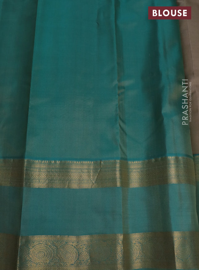 Pure kanchipuram silk saree beige and teal green shade with zari woven buttas and long rettapet zari woven border