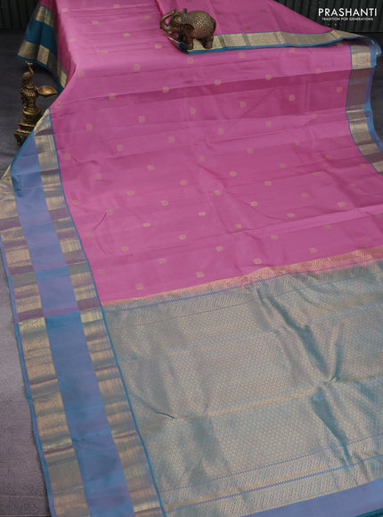 Pure kanchipuram silk saree mauve pink and teal blue shade with zari woven buttas and long rettapet zari woven border