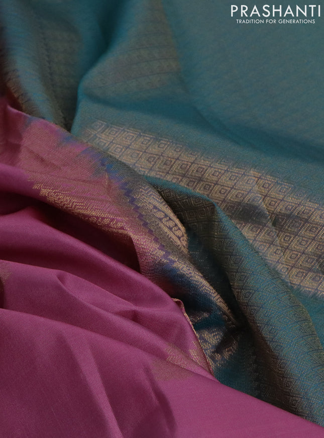 Pure kanchipuram silk saree mauve pink and teal blue shade with zari woven buttas and long rettapet zari woven border