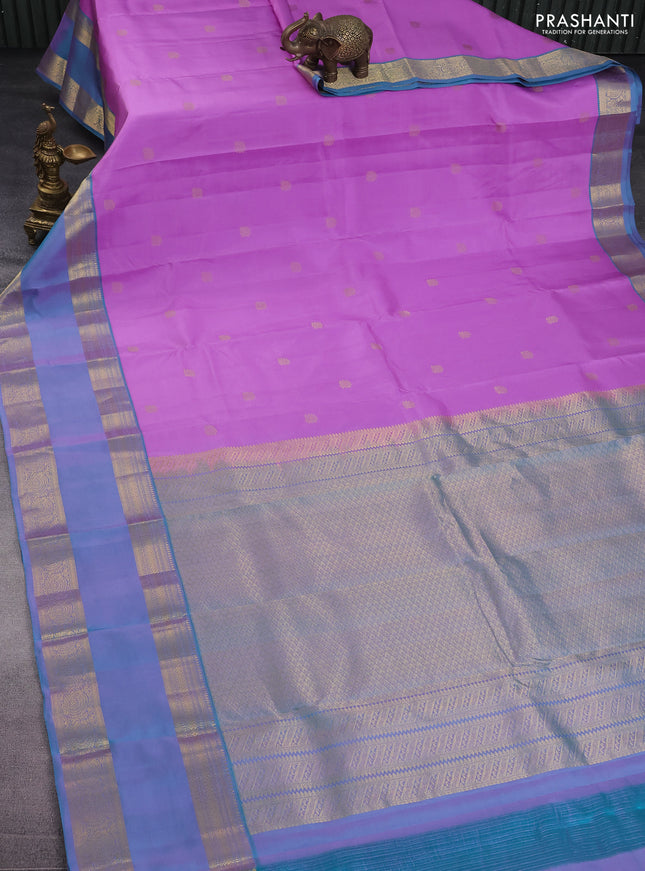 Pure kanchipuram silk saree lavender and dual shade of teal blue with zari woven buttas and long rettapet zari woven border