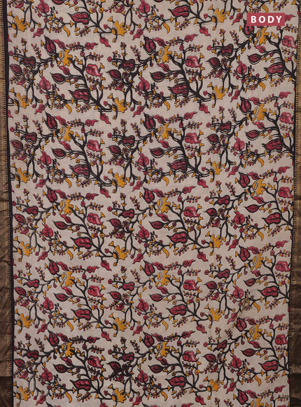 Kalamkari semi silk saree beige and black with allover kalamkari prints and zari woven border