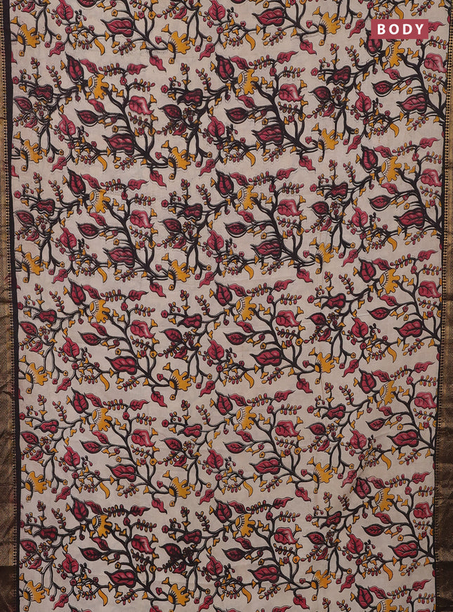 Kalamkari semi silk saree beige and black with allover kalamkari prints and zari woven border