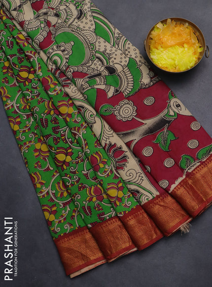 Kalamkari semi silk saree green and maroon with allover kalamkari prints and zari woven border