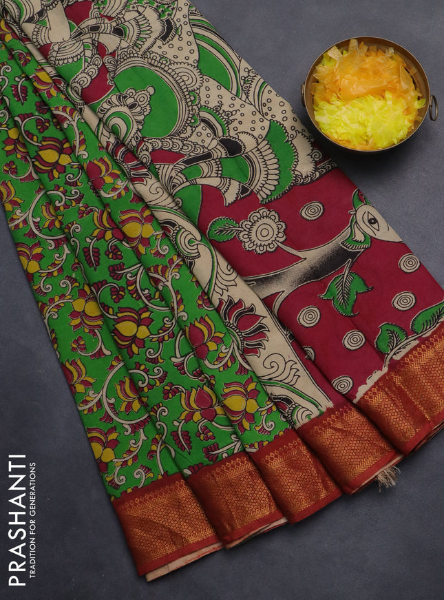 Kalamkari semi silk saree green and maroon with allover kalamkari prints and zari woven border