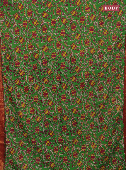 Kalamkari semi silk saree green and maroon with allover kalamkari prints and zari woven border