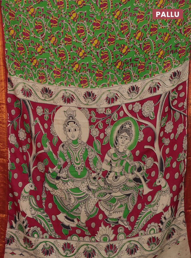 Kalamkari semi silk saree green and maroon with allover kalamkari prints and zari woven border