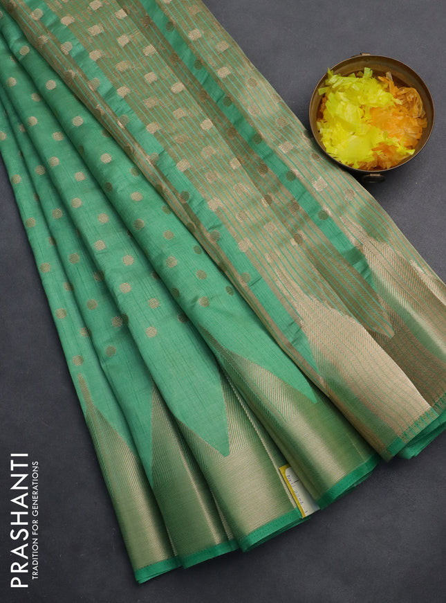 Semi raw silk saree pastel green with allover zari woven 1000 buttas and temple design zari woven border