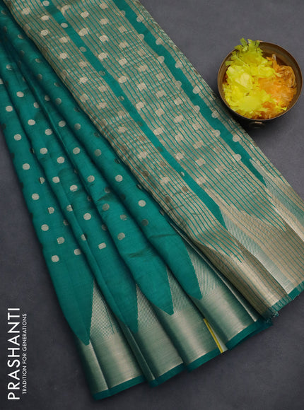 Semi raw silk saree teal blue with allover zari woven 1000 buttas and temple design zari woven border