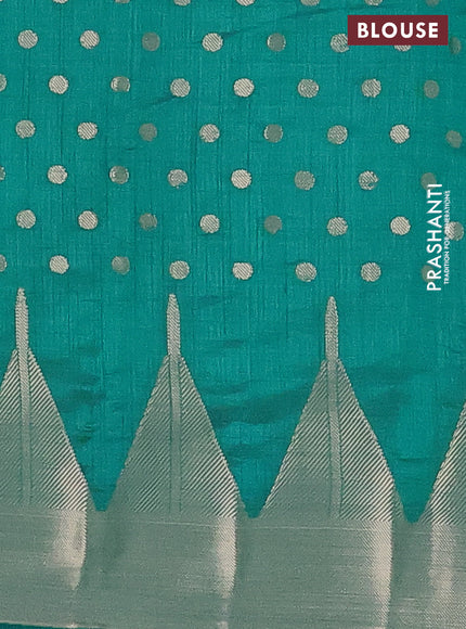 Semi raw silk saree teal blue with allover zari woven 1000 buttas and temple design zari woven border